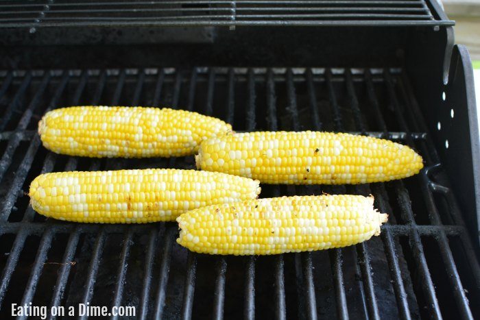 Close up image of corn on the cob on the grill. 