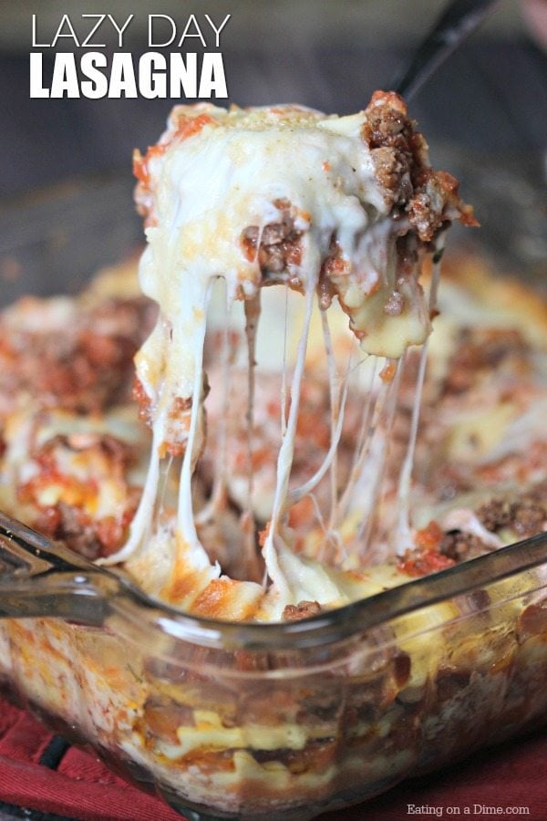 This easy lasagna recipe tastes like traditional lasagna without all the work. This is the best simple lasagna casserole recipe with mozzarella cheese, ground beef and with ravioli. This lasagna bake recipe is quick and easy with no boil needed for the noodles. You’ll never make a traditional lasagna after making this lazy day recipe. #eatingonadime #lasagnarecipe #lazydayrecipes