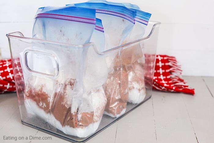 Close up image of brownie mix in ziplock bag in a storage container. 