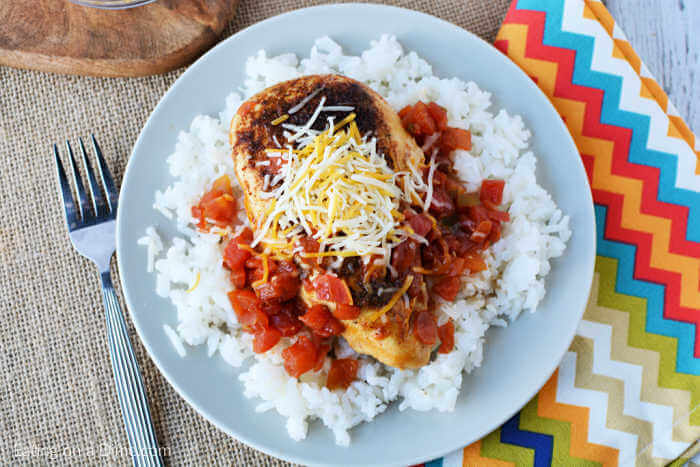 Tex Mex Chicken Skillet Recipe is so easy to make and has tons of southwestern flavor.  Enjoy with rice for a quick meal in 20 minutes your family will love.