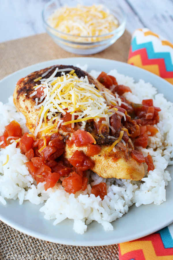 Tex Mex Chicken Skillet Recipe is so easy to make and has tons of southwestern flavor.  Enjoy with rice for a quick meal in 20 minutes your family will love.