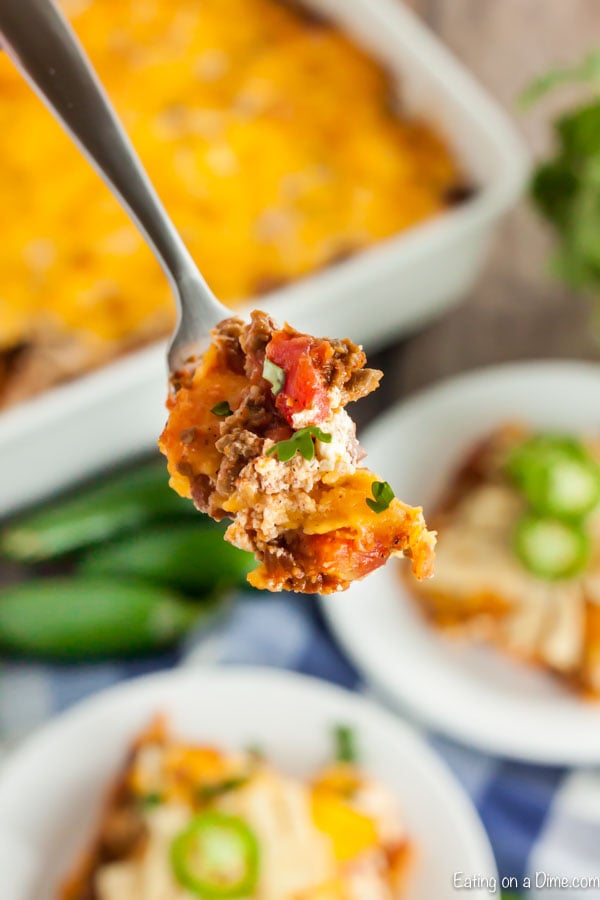 A bite of the Mexican casserole on a fork. 