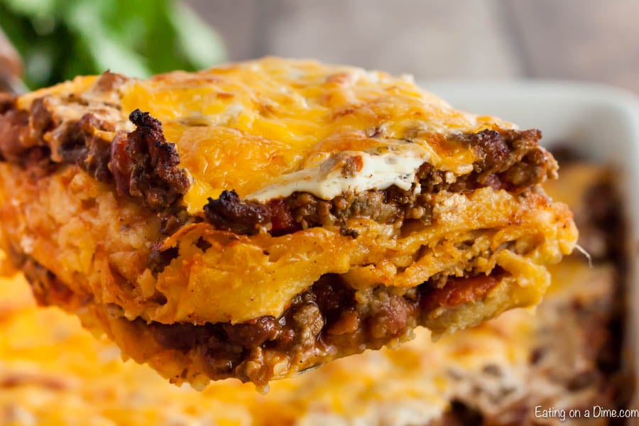 Close up of a piece of this Mexican casserole being removed from the baking pan.  