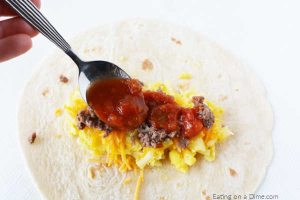 Try Freezer Breakfast Burritos Recipe for an easy meal on busy mornings that everyone will enjoy. Loaded with eggs, cheese and more for a great breakfast. 