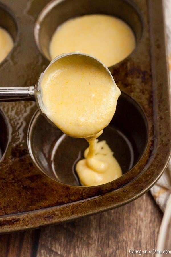 batter going into muffin pan