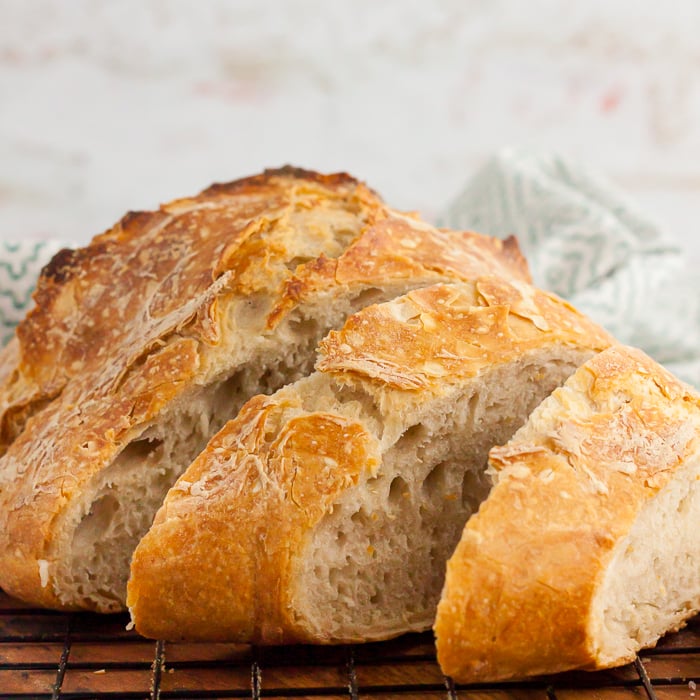 Artisan Bread sliced on a cooling rack