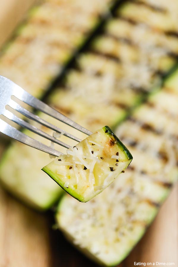 Parmesan Grilled Zucchini with a bite on a fork