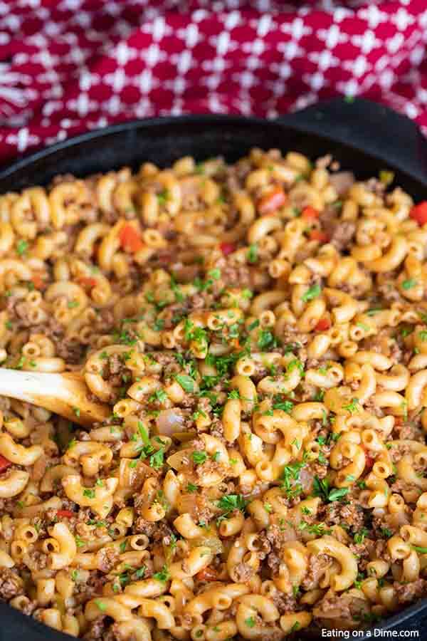 Skillet macaroni and beef recipe has everything you need for a great dinner. Try this budget friendly meal that is ready in minutes! 