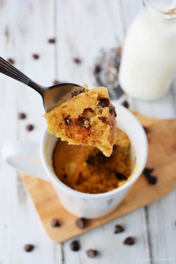 Close up photo of mug cake with a spoon. 