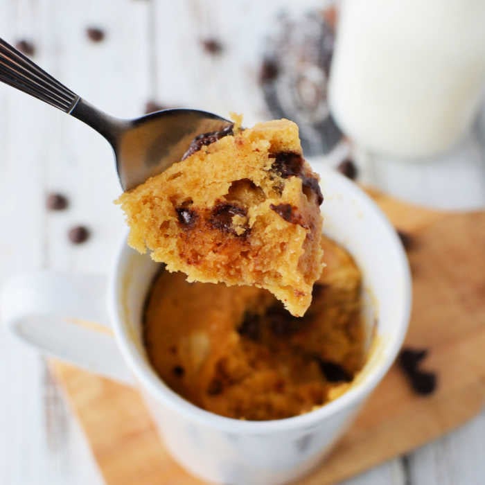 Close up photo of mug cake with a spoon. 