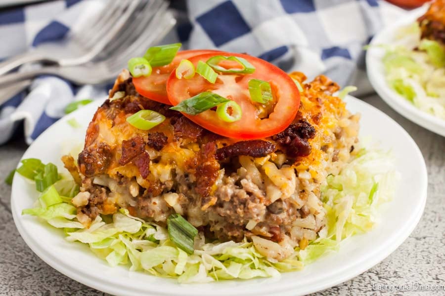 White plate with serving of bacon cheeseburger casserole on it. 