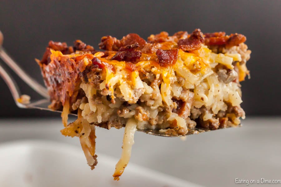 Spatula with bacon cheeseburger casserole serving on it. 