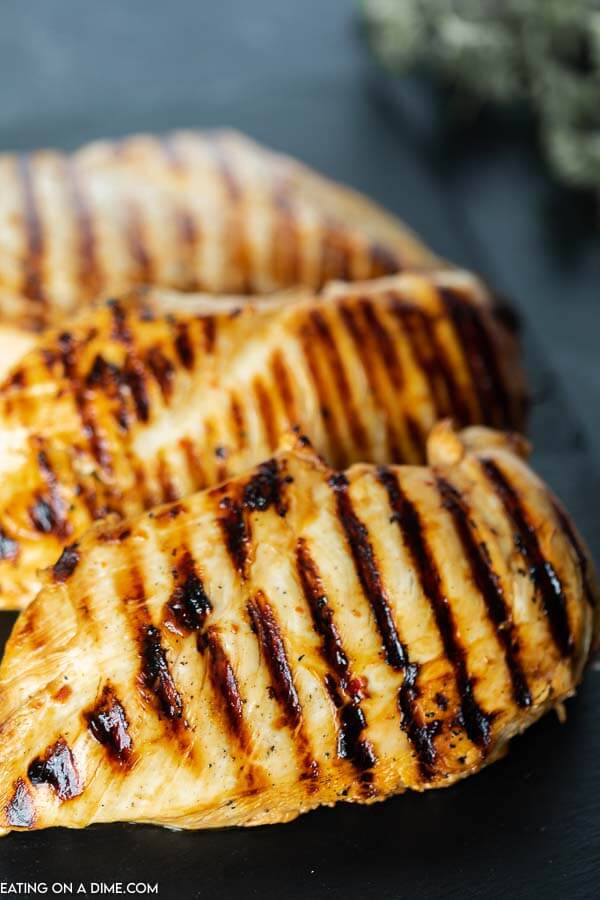 You are going to love this 2 ingredient chicken marinade that is perfect for grilled or baked chicken. This Italian Soy Sauce Marinade is easy to make and packed with flavor. This is definitely of the best chicken marinades! #eatingonadime #marinaderecipes #grillingrecipes 