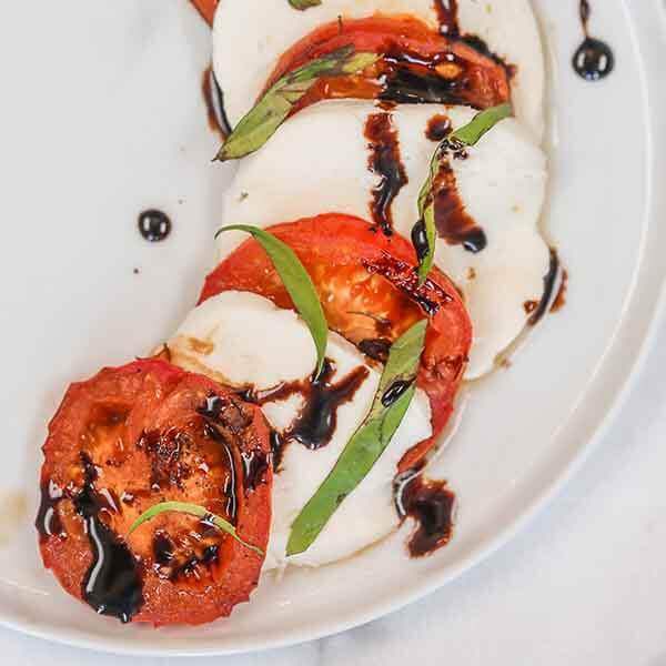 Jazz us Caprese salad with this Roasted tomato and mozzarella salad. The tomatoes are roasted to perfection and the entire dish is delicious.