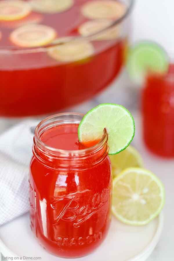 Fruit Punch in a mason jar with a slice of fresh lime
