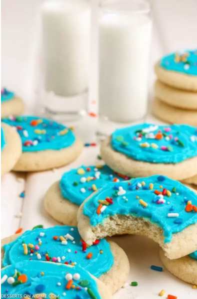 Photo of Lofthouse cookies with cups of milk.