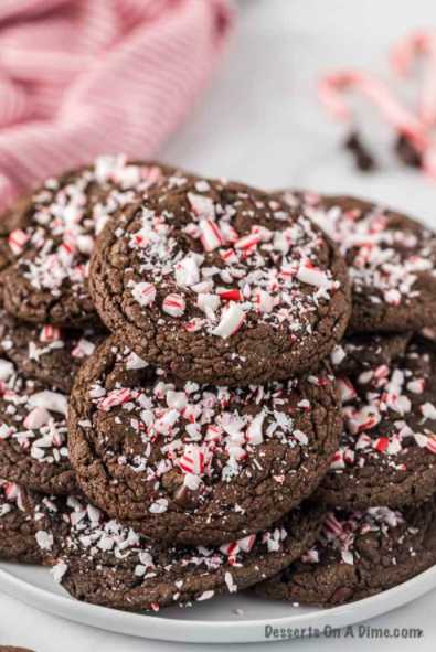 Closeup photo of chocolate peppermint cookies on a white plate. 