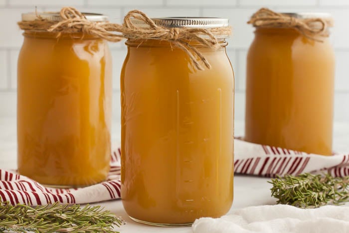 Mason jars of chicken stock