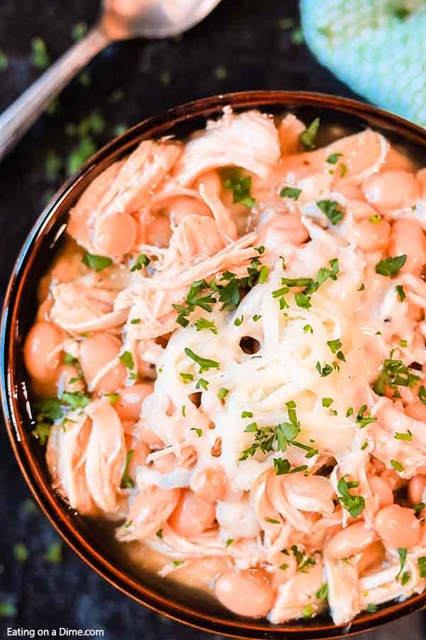 Crockpot White Chicken Chili is a family favorite around here and so easy to prepare. You can make this meal for under $5 making this a frugal meal idea. 