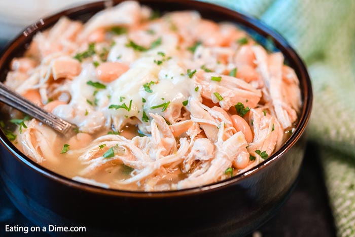 Crockpot White Chicken Chili is a family favorite around here and so easy to prepare. You can make this meal for under $5 making this a frugal meal idea. 
