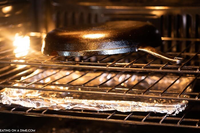season cast iron in the oven