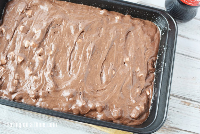 The chocolate cola cake batter in a pan