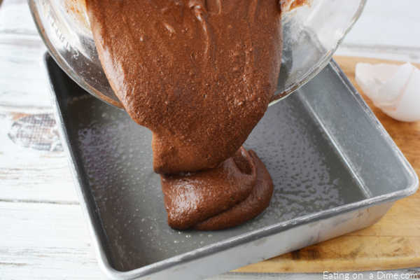 brownie batter going into pan