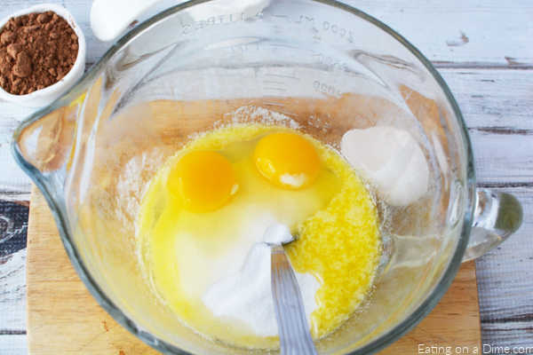 eggs and melted butter in bowl