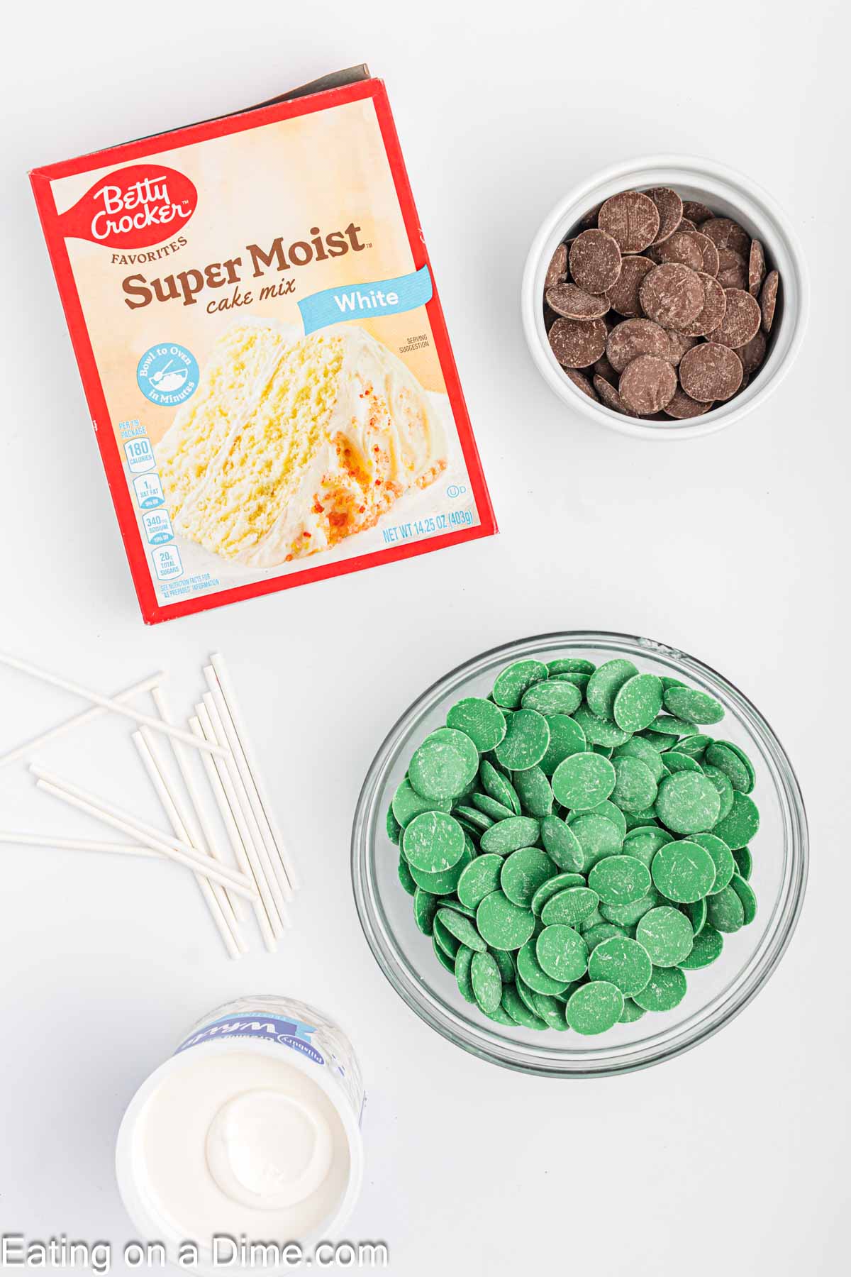 Minecraft Cake Pops - Cake Mix, frosting, lollipop stick, green candy melts, foam black
