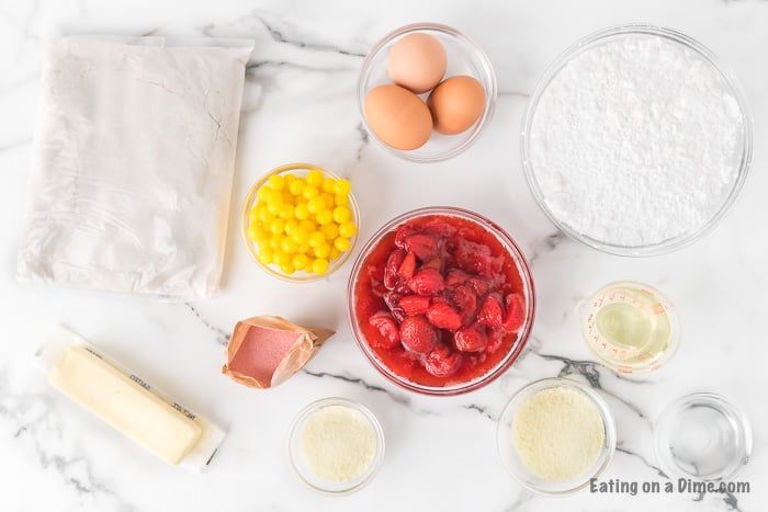 Strawberry Lemonade Cupcake Ingredients - White cake mix, strawberry jello, lemonade mix, strawberries