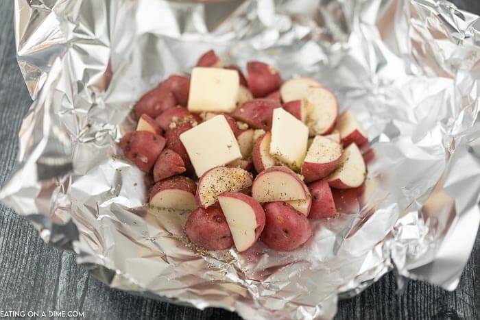 Foil pack grilled red potatoes help to make dinner a breeze without any cleanup. This is the perfect side dish for the grill or the oven. 