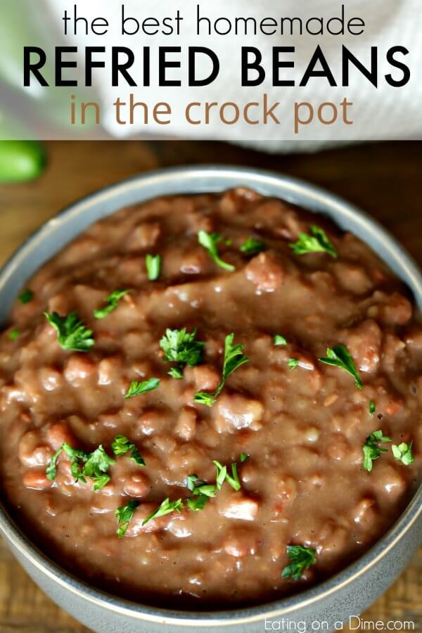 Learn how to make refried beans by cooking them in the crockpot! It is so easy to make Crock Pot refried beans and saves a ton of money.