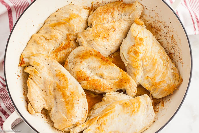 Cooking chicken breast in a skillet