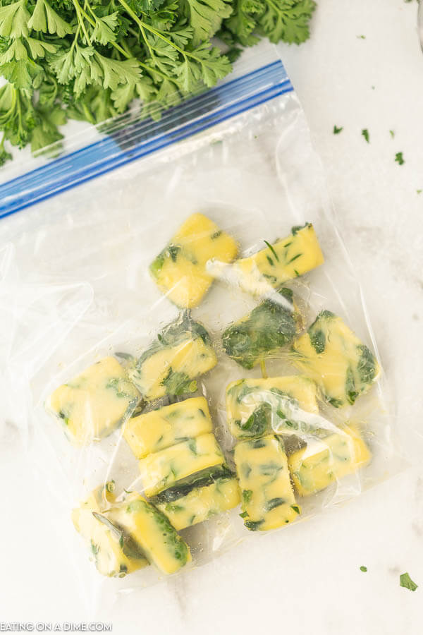 photo of frozen cubes of herbs in a freezer bag