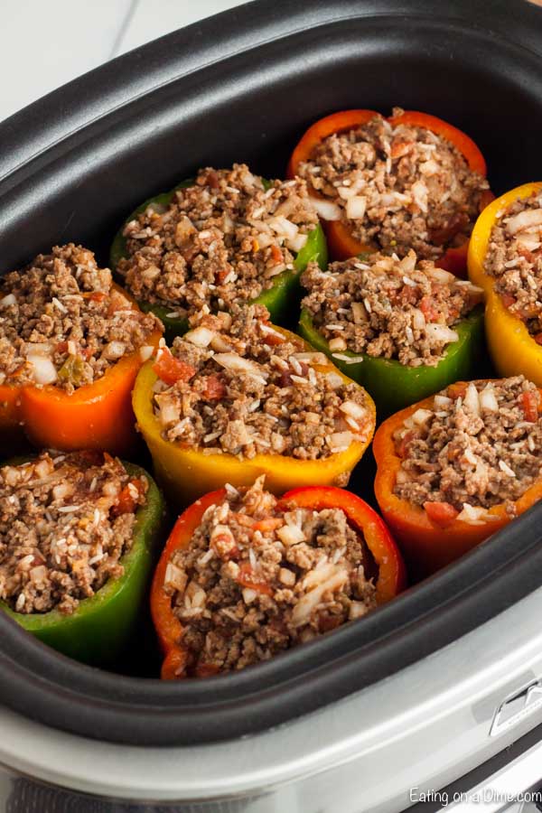 Need an easy crock pot recipe? Try this delicious Crock pot Stuffed Peppers recipe that is better than the traditional stuffed peppers recipe.