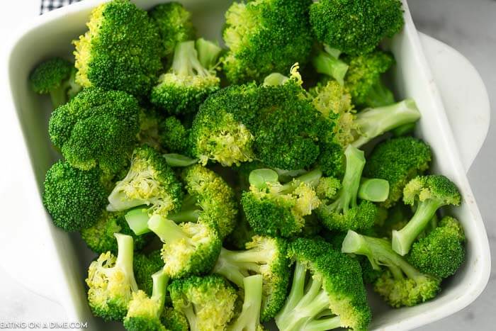 A large dish of freshly steamed, bright green broccoli