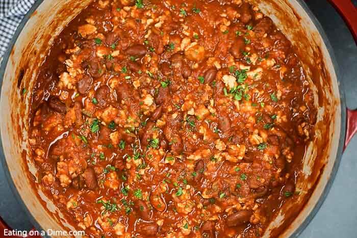 Close up image of a pot of turkey chili. 