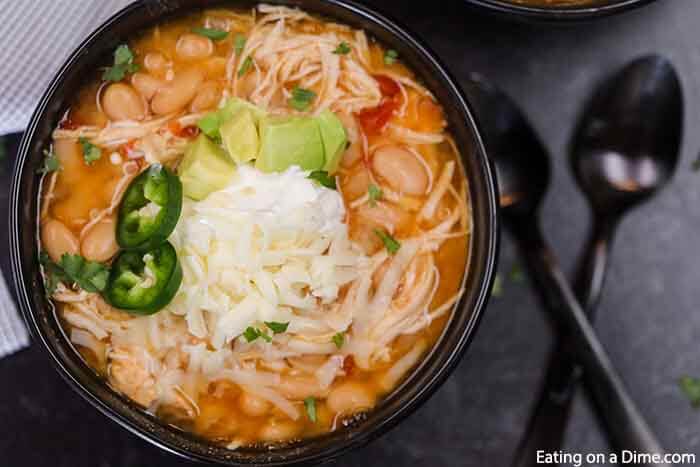 Crock pot white chicken taco chili recipe is delicious on a cold day. It is super easy and kid approved. You can add your favorite toppings!