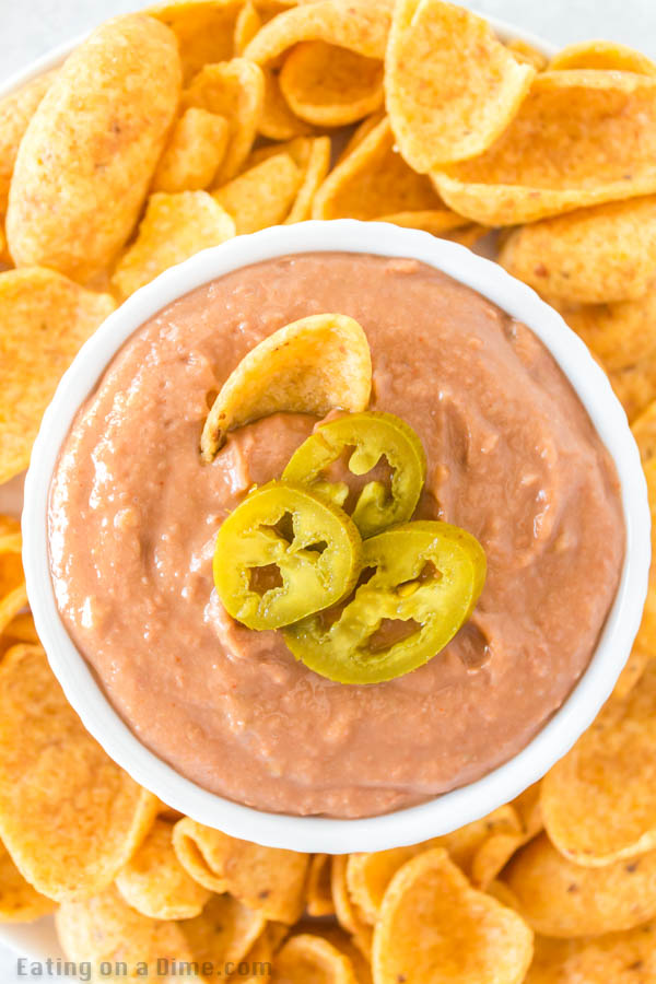 Learn how to make Fritos bean dip at home for a fraction of the cost of store bought. This is the best dip for parties, movie night or Game Day!