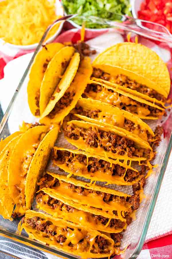 When you are cooking for a crowd or a big family, Oven Baked Tacos are the perfect meal. They are easy to make in a huge batch to feed a crowd and so tasty.