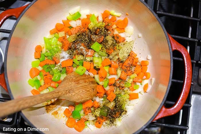 The seasoning being adding to a stock pot.  