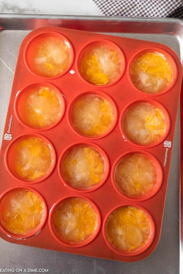 Frozen egg white in a muffin pan