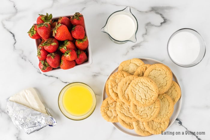 These strawberry crunch bars are easy to make and very delicious! This no bake strawberry crunch bars recipe with cookies is perfect for any occasion. These strawberry cookie bars are simple to make. You are going to love these strawberry crumb bars! #eatingonadime #easydesserts #strawberrydesserts These strawberry crunch bars are easy to make and very delicious! This no bake strawberry crunch bars recipe with cookies is perfect for any occasion. These strawberry cookie bars are simple to make. You are going to love these strawberry crumb bars! #eatingonadime #easydesserts #strawberrydesserts