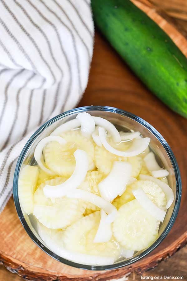 Cucumber Onion Salad in a clear bowl