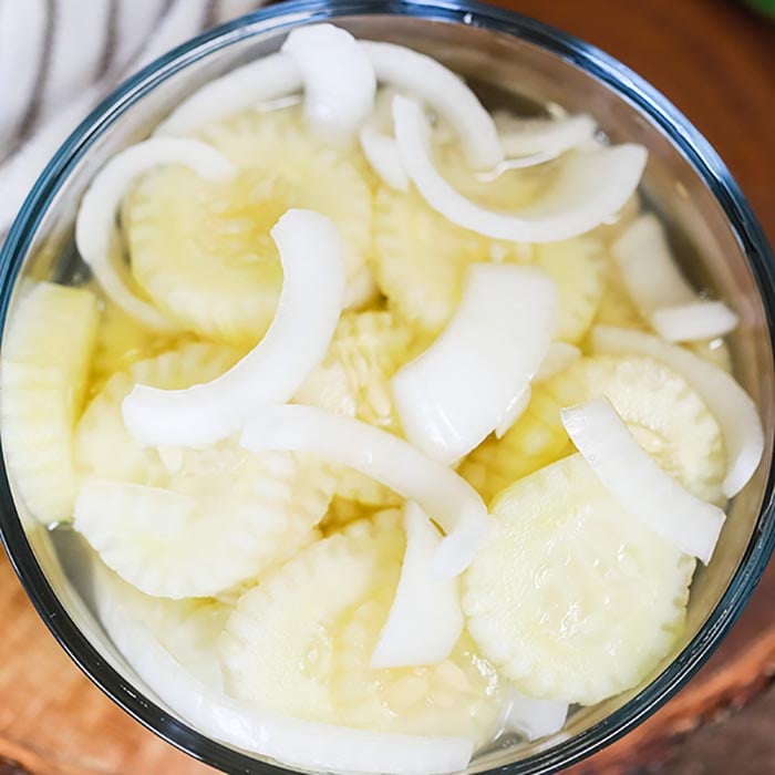 Cucumber Onion Salad in a clear bowl