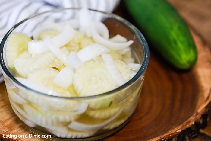 Cucumber Onion Salad in a clear bowl