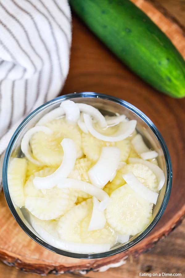 Cucumber Onion Salad in a clear bowl