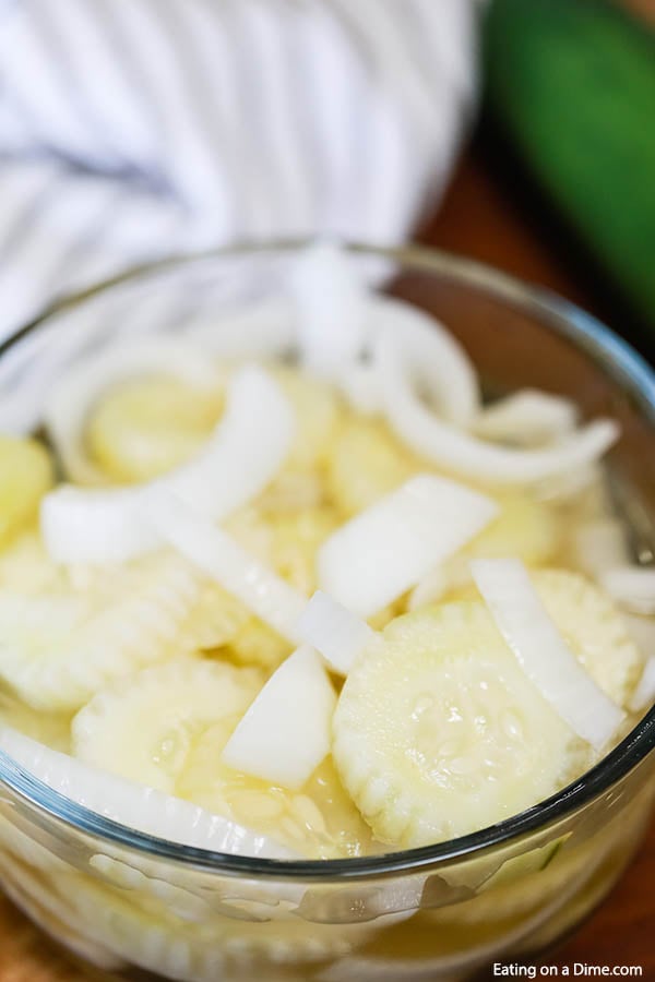 Cucumber Onion Salad in a clear bowl