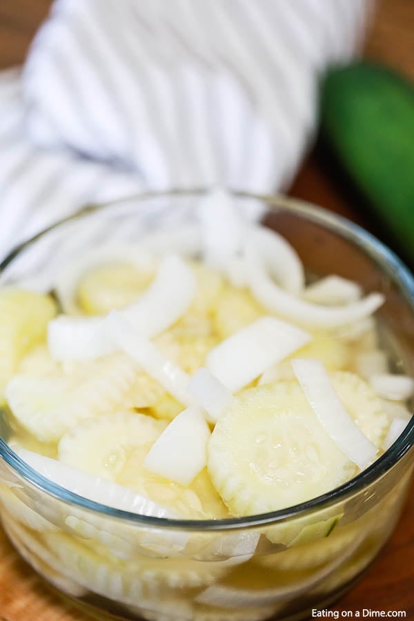 Cucumber Onion Salad in a clear bowl