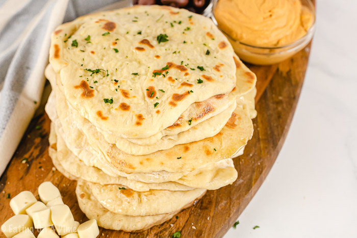 This naan bread recipe is so simple and easy to make! It is easy to make and tastes amazing! You'll never buy naan bread from the store again!
